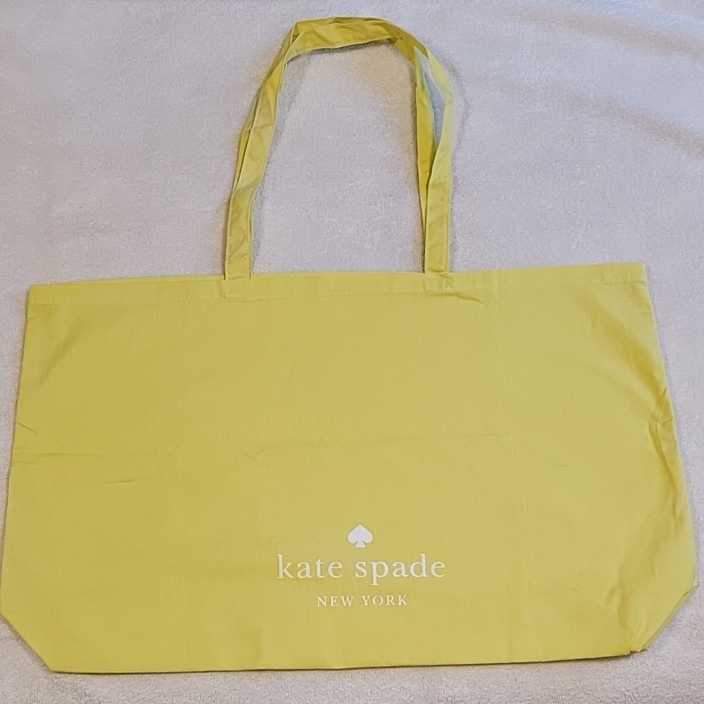 kate spade Yellow Tote Bag with Durable Canvas Material and Classic Shape